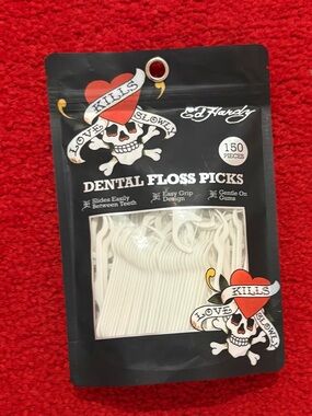 Ed Hardy Black Pouch with White Dental Floss Picks